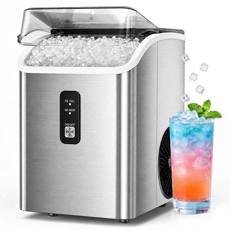 A stainless steel countertop ice machine filled with crushed ice, shown on a white background with a colorful drink and mint garnish beside it.