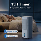 A white portable cooling fan or air cooler stands on a bedroom floor next to a bed with a sleeping woman, with promotional text reading '15H Timer' and 'Designed for Peaceful Sleep.'.