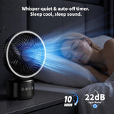 A small black desk fan with a circular white ring around the blades is shown on a bedside table next to a sleeping woman in bed. White text at the top reads 'Whisper-quiet & auto-off timer.